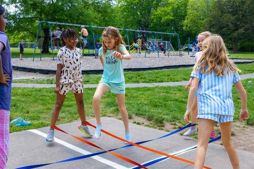 Students dance outside